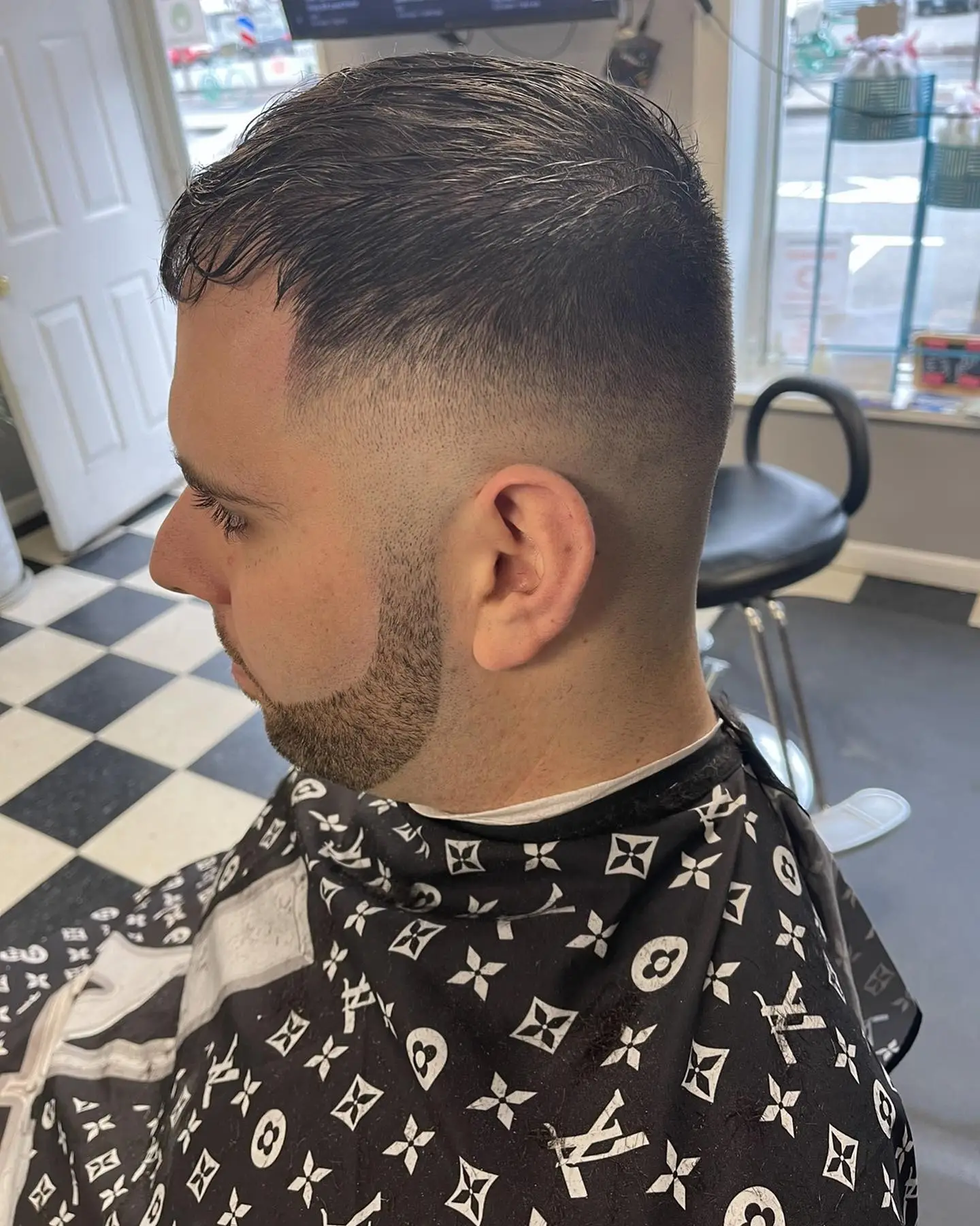 Skin fade haircut, side view